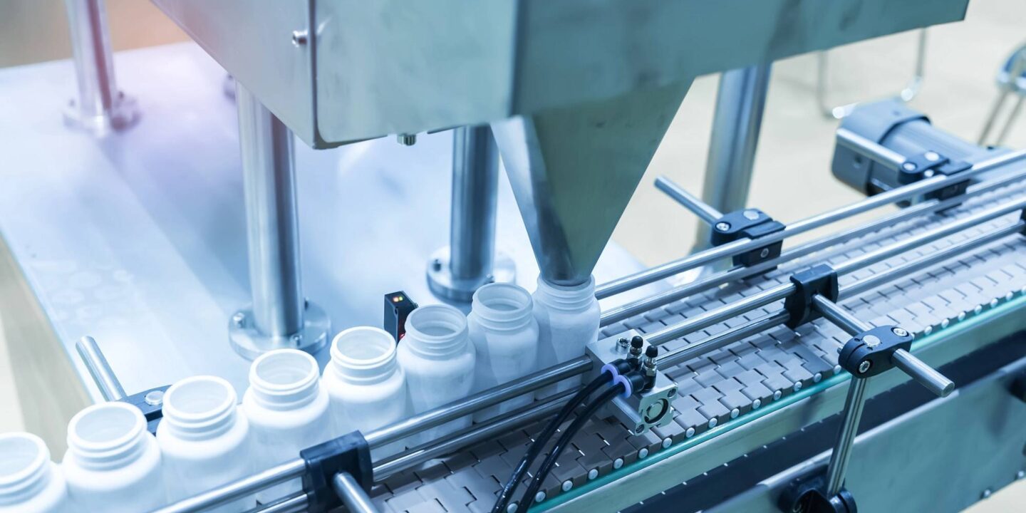 Pharma packing production line conveyer at factory - Five-Step Guide To Effective Pharma Manufacturing Outsourcing | NSF